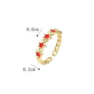 Detail view of the red enamel star charm and golden adjustable band with dimensions