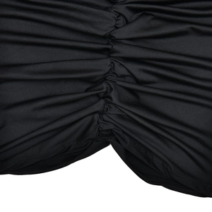 Detail shot of black mesh dress featuring elegant ruched stitching and pleated texture