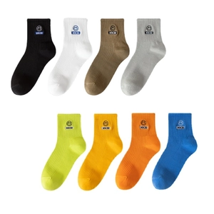 Set of 8 colorful mid-calf cotton socks with embroidered smiley face and NICB lettering
