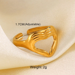 Detailed shot of a gold-plated heart-shaped open ring showing adjustable 1.7cm size