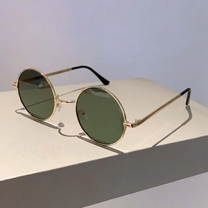 Lunettes de soleil rondes vintage classiques avec monture dorée et verres foncés