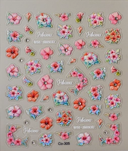 Détail macro de stickers 3D pour ongles hibiscus avec fleurs roses et strass brillants