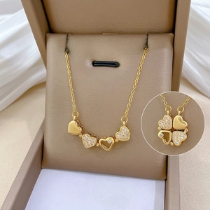 Versatile titanium steel necklace with heart magnets folding into a lucky clover design