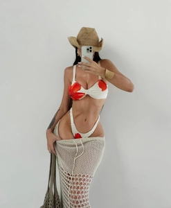 Detail of floral bikini set with off-white crochet hollow out beach cover up dress
