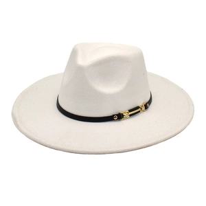 Detailed close-up of white wool fedora with black band and golden H metal buckle detail
