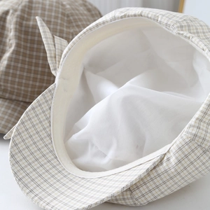Japanese style beige plaid beret for women featuring retro bow ribbon and cotton lining