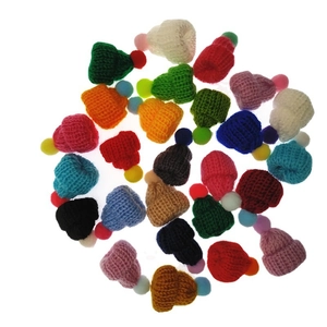 Mini colorful knitted wool hats with pom-poms for DIY crafts and bottle decorations