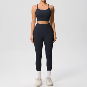 Close-up of black double-sided brushed yoga set featuring sports bra and high-waist leggings