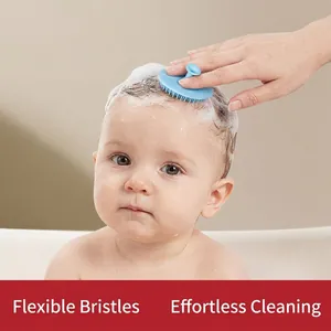 Soft silicone baby hair brush in light blue for gentle scalp cleaning and massage