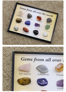 Detail view of 12 natural crystal and mineral specimens in a black collector box