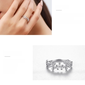 Macro detail of S925 sterling silver daisy ring with cubic zirconia in a claw inlay