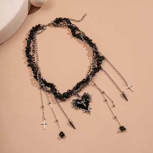 Gothic punk necklace with irregular black stone beads, metal crosses and heart pendant