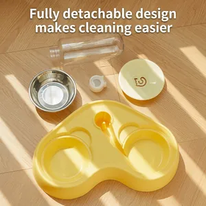 2-in-1 pet automatic water and food feeder with stainless steel bowl in yellow base