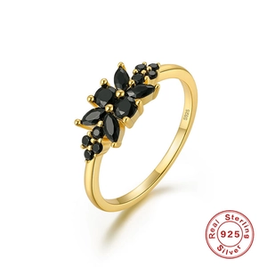 Detail of S925 sterling silver ring showing the flower shape and black gemstone petals
