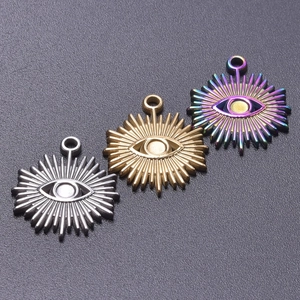 Three evil eye pendant charms in gold, silver and rainbow colors for jewelry making