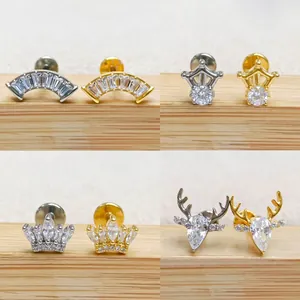 G23 titanium labret stud set with heart and pineapple zircon designs in gold and silver