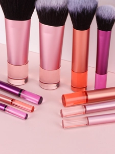 Detail of 10-piece makeup brush set with metallic handles and soft synthetic bristles