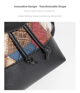 Macro shot of durable double stitching on black textured leather contrast bucket bag