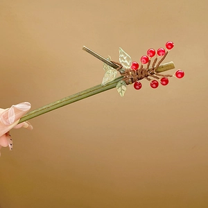 Traditional Chinese style green hair stick with red pearl berries and glass leaves