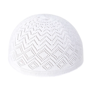 Detailed view of the hollow geometric knit pattern on a white breathable cotton kufi hat