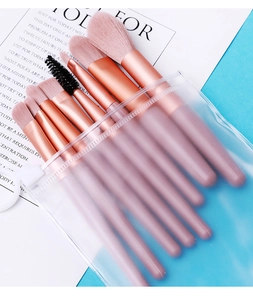 8-piece pink makeup brush set with soft fiber bristles and translucent zipper pouch