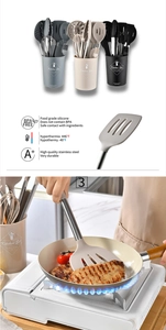 Detail of multi-color silicone kitchen utensils with durable stainless steel handles