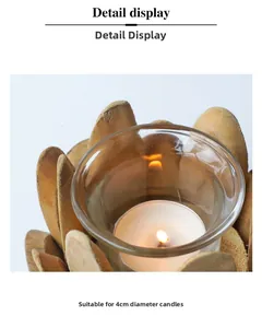 Detail view of lotus-shaped driftwood candle holder with transparent glass insert