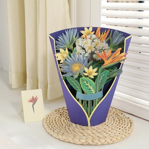 3D pop-up greeting card featuring a vibrant paper bouquet with bird of paradise flowers