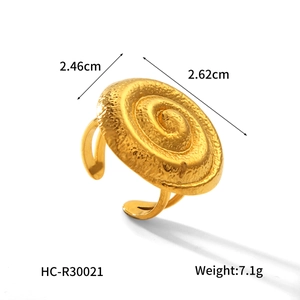 Detail view of 18K gold plated stainless steel spiral ring with hammer texture and dimensions