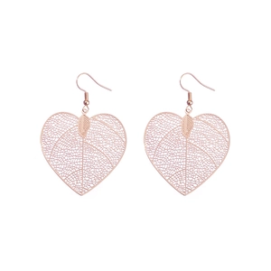 Detailed view of heart-shaped earrings with fine gold leaf vein texture on white background