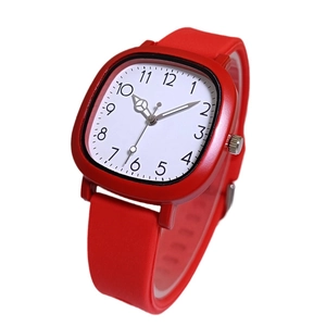 Retro square student watch with red silicone strap and white dial on white background