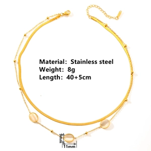 Double-layered 18k gold plated stainless steel necklace with white cat eye stone beads