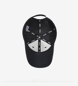Detail view of the interior seams and FBXS reinforcement tape on a black baseball cap