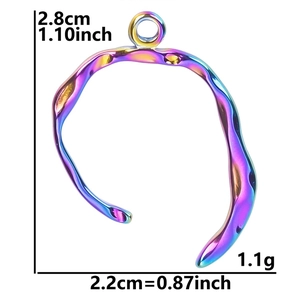 Irregular geometric pendant detail with dimension measurements 2.8cm by 2.2cm