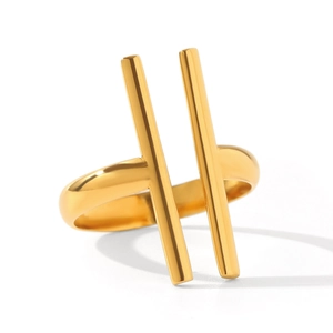 Detail shot of the gold geometric ring with parallel vertical bars and polished finish