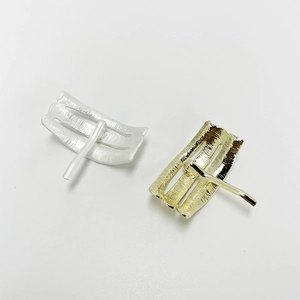 Minimalist U-shaped hair clip set in brushed silver and polished gold metal finishes