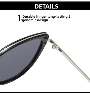 Close-up of durable silver metal hinge connecting black cat-eye frame and sleek temple