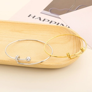 Minimalist adjustable ball end bangle bracelets in gold and silver finish for women