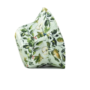 Close-up of floral bucket hat with mint green pear print and silver ventilation eyelets