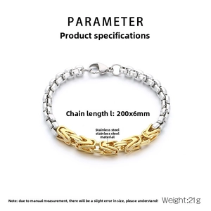Detail view of two-tone gold and silver Byzantine chain link bracelet with lobster clasp