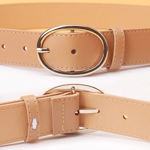 Light brown PU leather belt for women with golden oval buckle and fine stitching