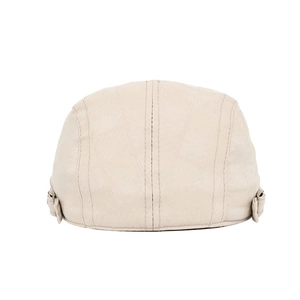 Detail of light beige retro flat cap with multi-line stitching and metal side buckle