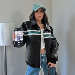 Vintage black faux leather racing jacket with green and white stripes and zip closure
