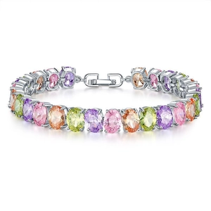 Sliver plated tennis bracelet featuring oval multi-colored zircon stones with claw setting