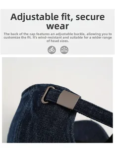 Close-up of adjustable metal buckle on dark blue denim baseball cap for custom fit