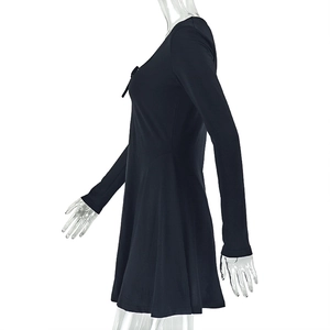 Side view of black A-line long sleeve dress with bow detail on a transparent mannequin