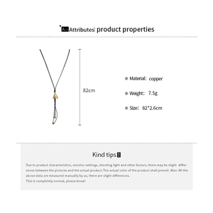 Detailed size specifications for the gold triangular pendant with black tassel necklace