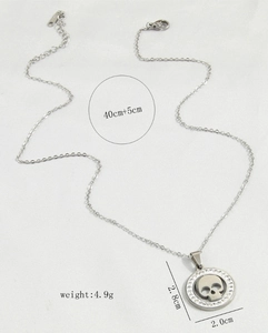 Detail view of skull tree pendant necklace with dimensions and weight measurements