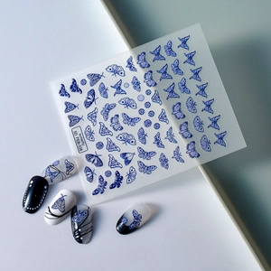 5D geprägte Nageltattoos mit blauen Schmetterlingsmotiven und realistischer 3D Textur