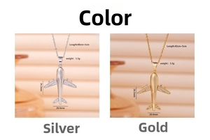 Detailed comparison of gold and silver airplane pendants with sparkling zircon wings